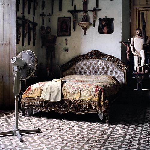 OLGA CHAGAOUTDINOVA | BED, CROSSES AND A FAN | C-PRINT | 61 x 61 CENTIMETERS | 2007