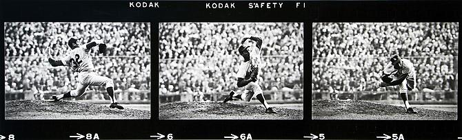 Sandy Koufax pitches in game 7 of the World Series, in Minneapolis vs. The Twins, on Thursday, October 14th, 1965.  The Dodgers win the series in 7 games, final score, 2-0