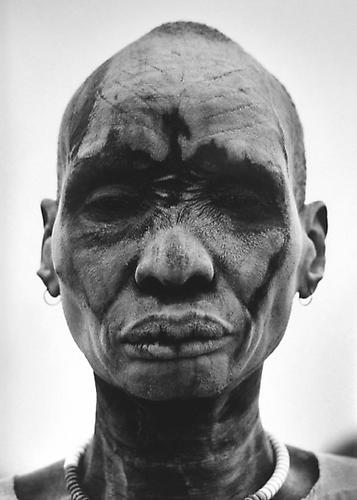 Dinka man at the cattle camp of Kei. People cover themselves with ash to sterilize the skin against insects and parasites, Southern Sudan
2006
gelatin silver print