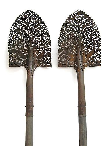 Shovel.
Metal Shovel, 57 x 9 x 5 inches.