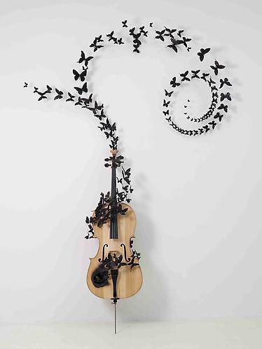 Paul Villinski, Fable  (2011)
Cello, Aluminum (found Cans), Stainless Steel Wire And Soot 
96h x 65w x 16d in (243.84h x 165.1w x 40.64d cm)