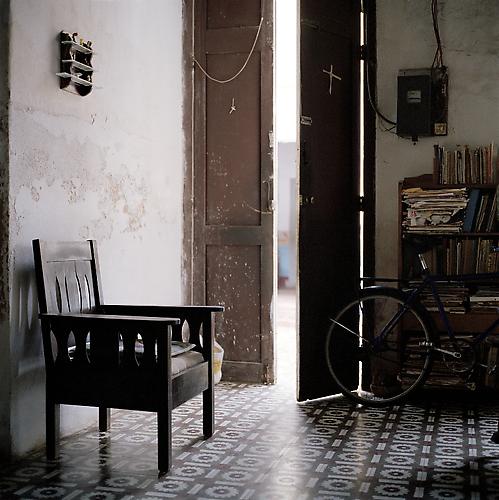 OLGA CHAGAOUTDINOVA | WOODEN CHAIR NEAR ENTRANCE | C-PRINT | 61 x 61 CENTIMETERS | 2007