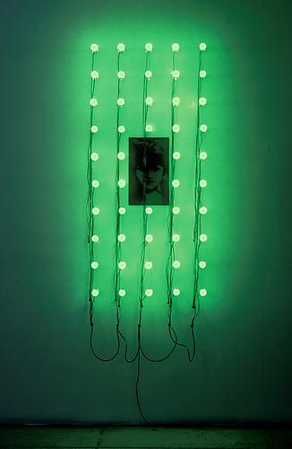Christian Boltanski
Lumieres (Vertical Green Rectangle- Catherine)   2000
48 green light bulbs, 1 photograph
110 x 34 in
Courtesy of Christian Boltanski and Marian Goodman Gallery