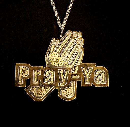 Dylan Mortimer, Pray-Ya, 2007.
Brass, Aluminum and Rhinestones, 6 x 7 3/4 inches.