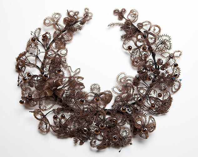 CINDY STELMACKOWICH | EYE WREATH | VICTORIAN HUMAN HAIR WREATH, METAL WIRE, GLASS TAXIDERMY EYES | 29 X 26 X 9 CM | 2011

IMAGE: RÉMI THÉRIAULT