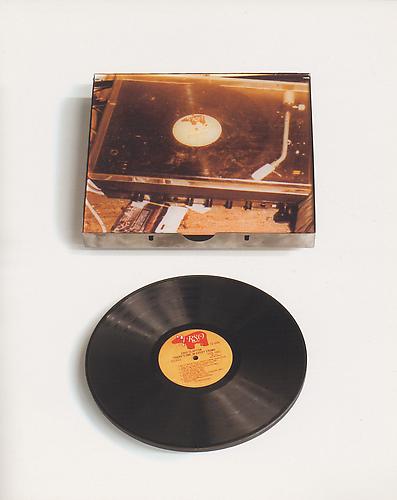  DENNIS ADAMS
Lullaby, 2004 
Vinyl record weighted with steel plate to retard the speed of a turntable
30 x x40 x 8 in., AP I/II, edition of 10