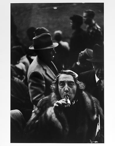 Woman drinking from bottle after game, Ebbetts Field, Brooklyn 
mid 1950s
Gelatin Silver Print