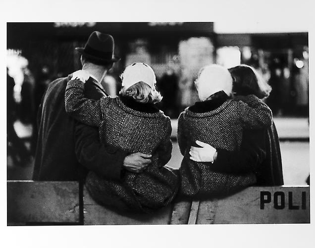 Children sitting on barricade with parents, New Year's Eve
mid 1950s
Gelatin Silver Print