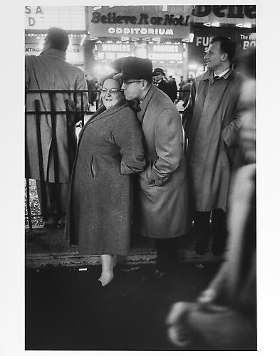 Couple under "believe it or not" sign, New Year's Eve
mid 1950s
Gelatin Silver Print