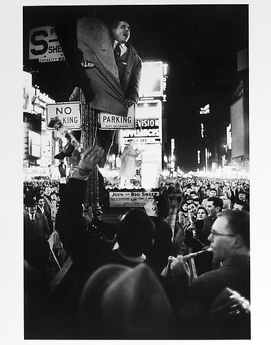 Man climbing on a light pole, New Year's Eve
mid 1950s
Gelatin Silver Print