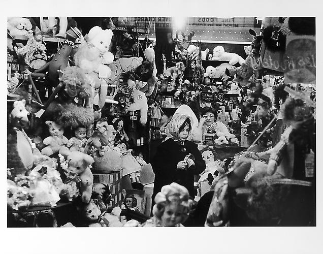 Girl in doll shop on Halloween 
mid 1950s
Gelatin Silver Print