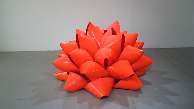 Piper Brett
Love Me, 2009.
22 Gage sheet steel, powder coated florescent red, 42 x 72 x 72 inches.