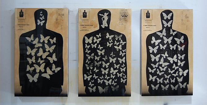 Combat Target / Master Butterfly Plates, 2011
Pistol targets, magazine print, paint, coffee and resin on wood panel
35 x 21 x 3; each