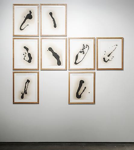  Untitled , 2009, installation view, motor oil on paper and artist studio frames, 8 panels, 29 x 22 inches each