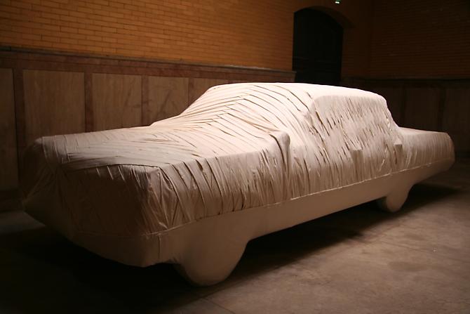 Jay Critchley,  FINAL PASSAGE , 2008
1965 Chevy Impala, mummified, muslin, mixed media, installed in an abandoned mausoleum, North Burial Ground, Providence, Rhode Island