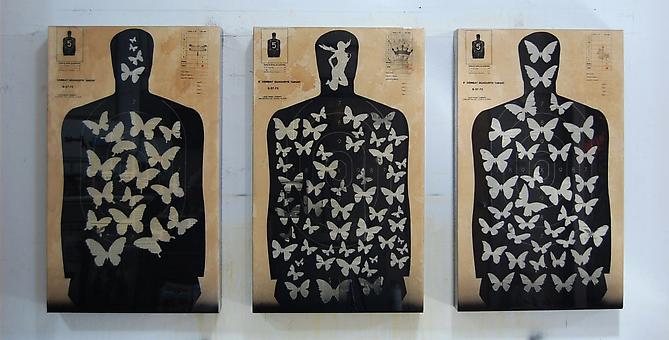Ellwood T. Risk
Combat Target / Master Butterfly Plates (B&W), 2011
Pistol targets, magazine print, paint, coffee and resin on wood panel
35 x 21 x 3 inches