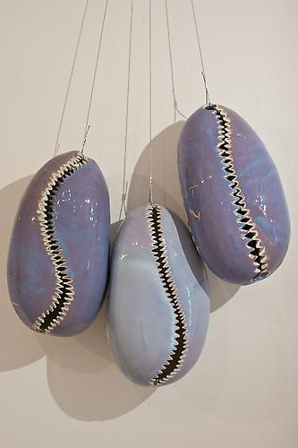 Untitled- Crystal Glazed Cowries, 2012
Crystal glazed porcelain and wire
52 x 21 x 8.75 inches (variable)