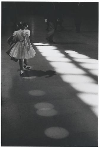 Girl Playing in Light Circles 
1958
gelatin silver print
