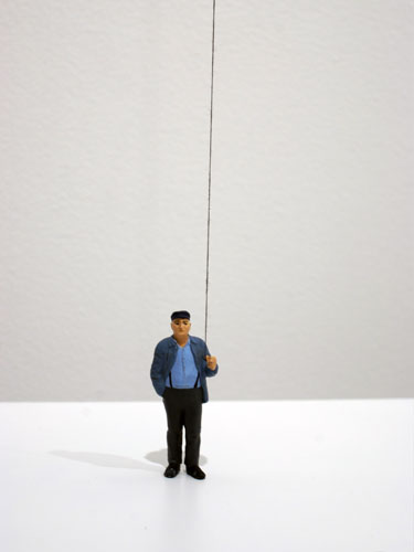 Liliana Porter, 2010, The Riddel (Man with Balloon) , (Detail), Figurine and helium balloon on wooden base,
Base: 12 x 9 x 1 inches Balloon height variable at approx. 70 inches high