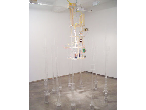  Un-Time Structure , 2004, Plexiglas, optical lenses, clock motors, light, wood, speakers, amplifiers, contact microphones, Mylar, 11 x 6 x 6 feet
