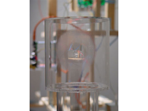  Un-Time Structure , 2004, detail, Plexiglas, optical lenses, clock motors, light, wood, speakers, amplifiers, contact microphones, Mylar, 11 x 6 x 6 feet