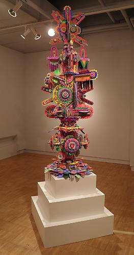 Lodestar,  2011
foam, plaster, acrylic, paper, mirror, glue and rotating base
120 x 36 x 36 inches