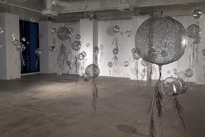 Macrospores, 2010
ink, mylar, vinyl and acrylic capsules
dimensions variable