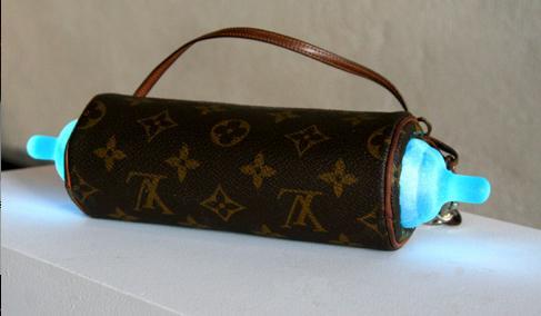 Duplex, 2011
Vintage Louis Vuitton, cast glass baby bottle nipples, LEDs, battery pack
2.17 x 9.75 x 2.5 inches
