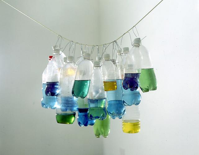 Tony Feher
Untitled 1996 
dimensions vary with installation 
plastic bottles, water, food dye, wire and rope