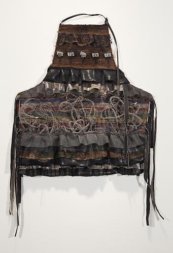 Anita Cooke
Bicycle Tire Apron #4   2009
Bicycle tire tubing, used electric kiln heating elements, produce bags, vinyl, window screening, polyester ruffle yardage, acrylic paint, burlap and electrical parts
35 x 29 in