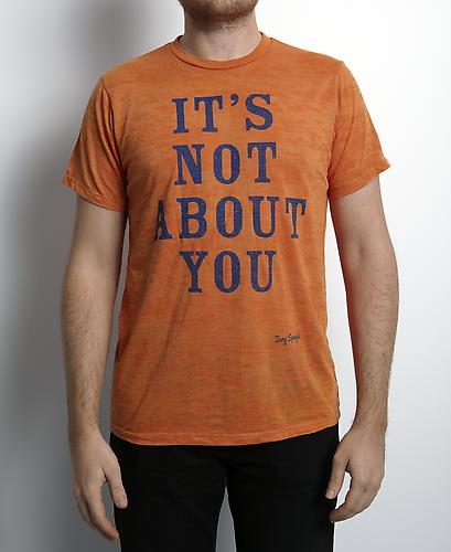 IT'S NOT ABOUT YOU
Signature Exhibition t-shirt in "burn-out" orange, cotton and rayon blend. S, M only. $24