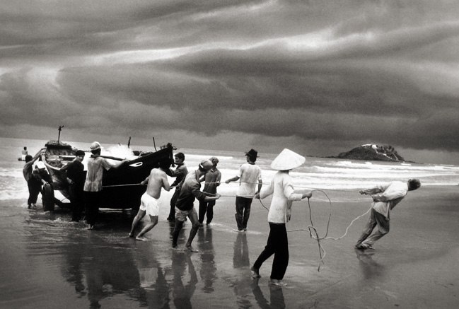 Vietnam, Boat people pulling Boat ashore
1995
gelatin silver print