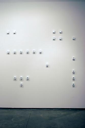 Marco Maggi, Blind Slides (installation view), 2009
Pencil on aluminum foil, slide mounts, 21 cubes (each 2 x 2 x 2 inches)