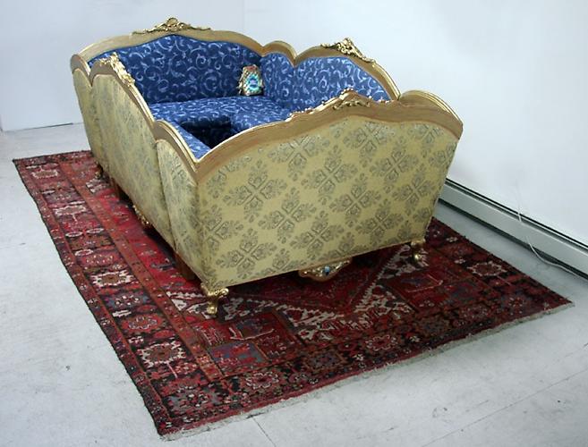 Suffocating Loveseat Sectional 2007 
Mixed media on wood with cushioned fabric
108 x 72 x 48 in / 270 x 180 x 120 cm
(rug not included)