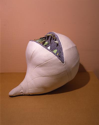  Verbe, 1969-70 
Flannel, wool, sawdust, tweed, cardboard, gun pellets, iron and wooden jigsaw puzzle pieces
18 1/2 x 18 3/4 x 24 3/4 in.
Yale University Art Gallery, New Haven, CT