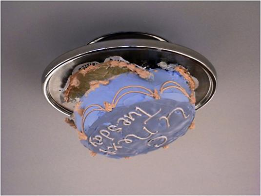 Trong Nguyen
	<i>C U Next Tuesday</i>, 2010
	Acrylic paint, Styrofoam,
	doily, aluminum cake
	stand
	12 x 7 inches
	38.48 x 17.78 cm
