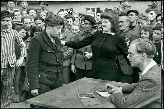 Gestapo Informer Recognized by a Woman She Had Denounced, Deportation Camp, Dessau, Germany, 1945