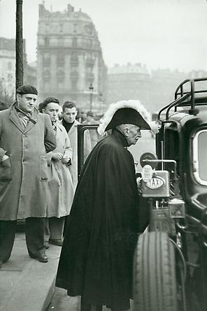 A member of the French Academy on his way to Notre-Dame, c. 1955