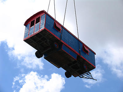 Lara Favaretto
<i>The Poor Are Mad</i>, 2005
suspended caravan, electric lights, music: Rosamunde.
Installation view at Chelsea College of Art & Design, Parade Ground, July 11-13, 2008