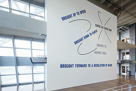 Lawrence Weiner
<i>BROUGHT UP TO SPEED,</i> 2009
Vinyl decals on wall
Dimensions variable
Permanent installation
Dallas Cowboys Stadium