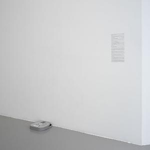 Ryan Gander
<i>Captatio Benevolentie - (Alchemy Box No. 14)</i>, 2008
Sealed Kodak videotape canister and rub down wall transfer text