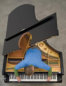<i>Stop, Repair, Prepare: Variations of Ode to Joy for a Prepared Piano</i> 2008
Prepared Bechstein Piano, Pianist (Amir Khosrowpour, depicted)
81” Long
Installation view: Museum of Modern Art, New York
Photo: Marino Solokov