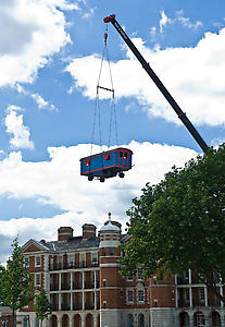Lara Favaretto
<i>The Poor Are Mad</i>, 2005
suspended caravan, electric lights, music: Rosamunde.
Installation view at Chelsea College of Art & Design, Parade Ground, July 11-13, 2008