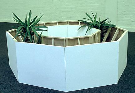 Ryan Gander
<i>Componenture - Space Filler (Proposal for a motorway service station entrance)</i>, 1998
Plywood, timber, paint and Yucca plants
Various