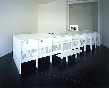 <i>Conditioning Justice,</i> 2004
Painted steel, wood, extractor fan, three air conditioning units
108 x 573 x 141cm