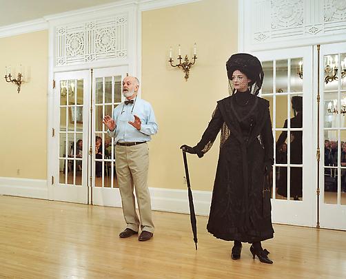 <i>Ivan Sayers, costume historian, lectures at the University Women's Club, Vancouver, 7 December 2009. Virginia Newton-Moss wears a British ensemble c. 1910, from Sayers' collection</i>, 2009 Image