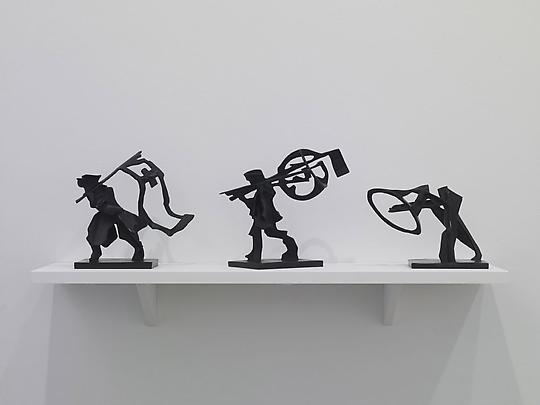 From left to right: <b>Man with Flag</b>, 2008; <b>Man with Globe</b>, 2008, <b>Megaphone</b>, 2008; 
Bronze. Image