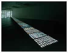 <i>Visible World</i>
1986-2001
15 light tables with 3000 small format photographs
92 ft. x 2 ft. 3 1/4 in. x 2 ft. 11 1/2 in.; 2805 x 69 x 83 cm