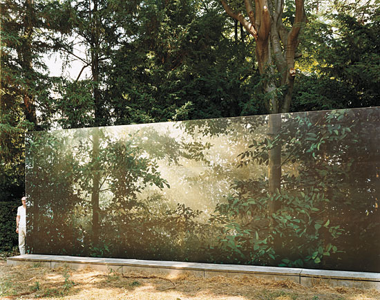 Thomas Demand installing one of his artworks at the gardens at the Venice Biennale. Photo by Jason Schmidt.
