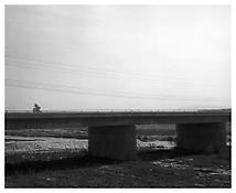 <i>Next to the Interstate 10 interchange at San Bernardino, California</i>
1982
Gelatin-silver print
11 x 14 inches; 28 x 36 cm
